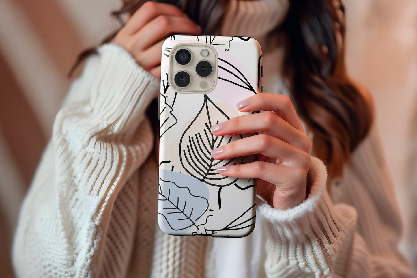 A cute girl holding our Abstract Leaves design phone case