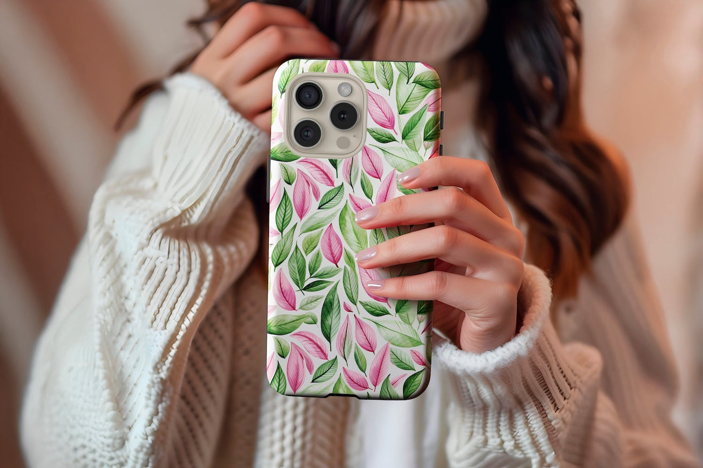 A cute girl holding our Pinky Leaves design phone case
